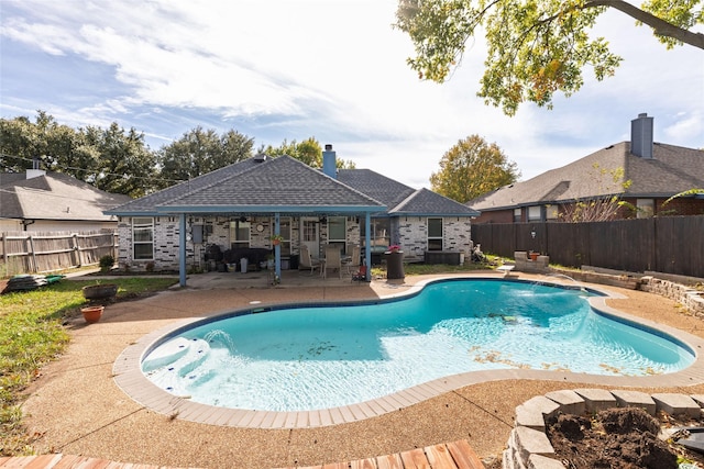 view of pool featuring a fenced backyard, a fenced in pool, and a patio