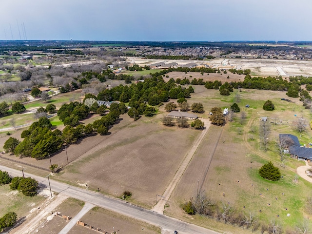 birds eye view of property featuring a rural view