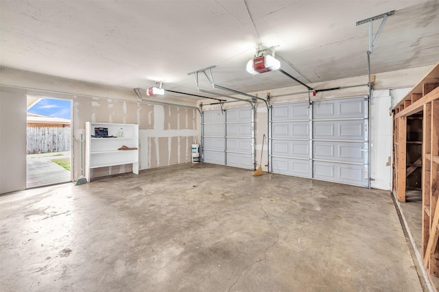 garage featuring a garage door opener