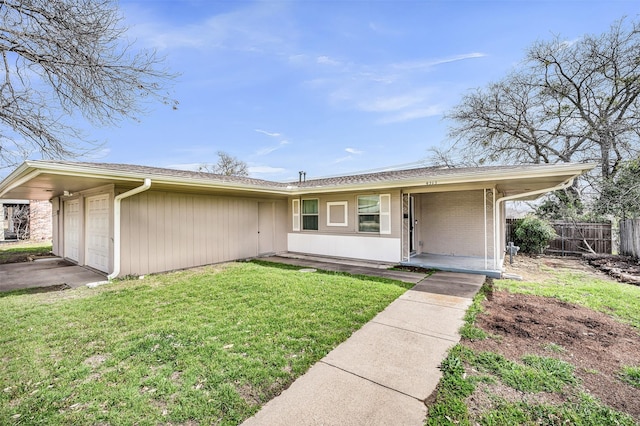 ranch-style house with brick siding, a front lawn, fence, a porch, and an attached garage