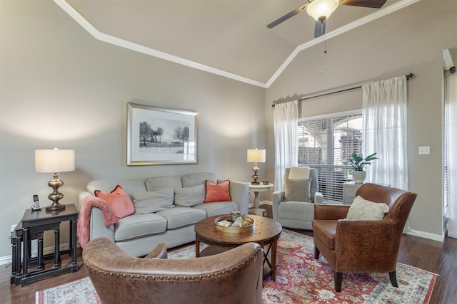 living area with ornamental molding, wood finished floors, baseboards, and vaulted ceiling