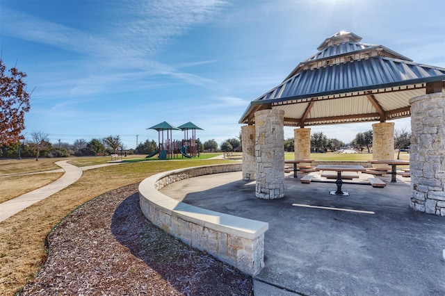 view of home's community featuring a gazebo, a lawn, and playground community