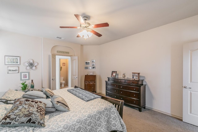 bedroom with light carpet, visible vents, baseboards, and ceiling fan