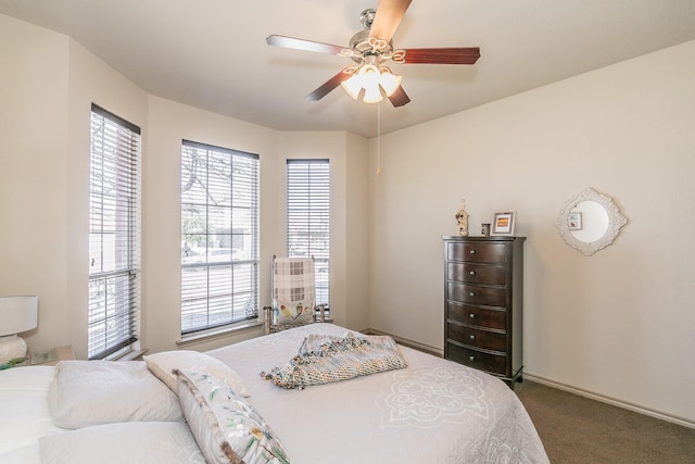 bedroom featuring carpet flooring, a ceiling fan, and baseboards