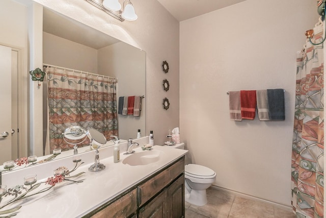 full bathroom with tile patterned floors, curtained shower, toilet, and vanity