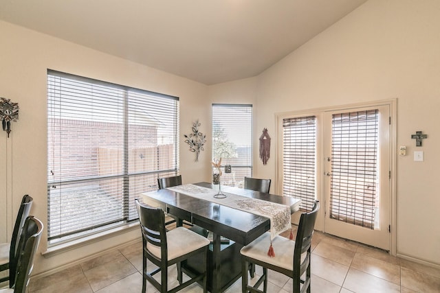 1013 Vista View Dr, Burleson, TX 76028 - dining room with light tile patterned floors, baseboards, french doors, and lofted ceiling