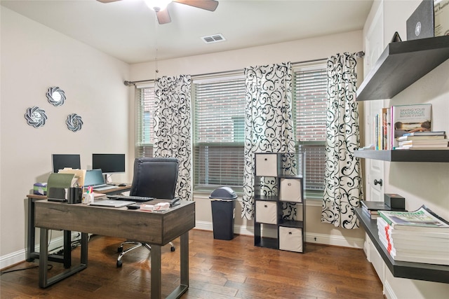 home office with baseboards, plenty of natural light, and hardwood / wood-style flooring