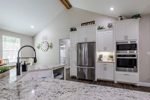 kitchen with white cabinets, dark wood-style floors, and stainless steel appliances