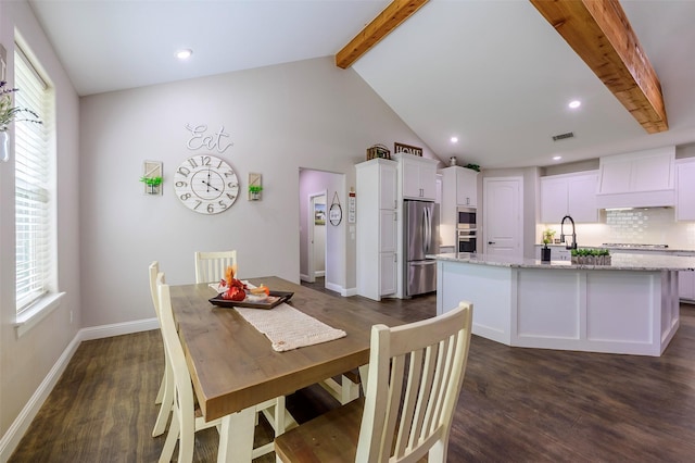 dining room with visible vents, lofted ceiling with beams, baseboards, and dark wood-style flooring