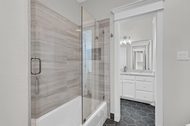 full bath featuring tile patterned floors, enclosed tub / shower combo, and vanity