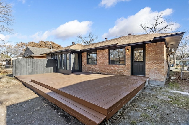 wooden deck featuring fence