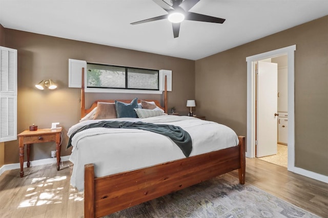 bedroom with baseboards, a ceiling fan, and light wood finished floors