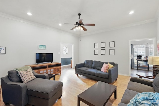 living room with recessed lighting, baseboards, light wood-style floors, and ornamental molding