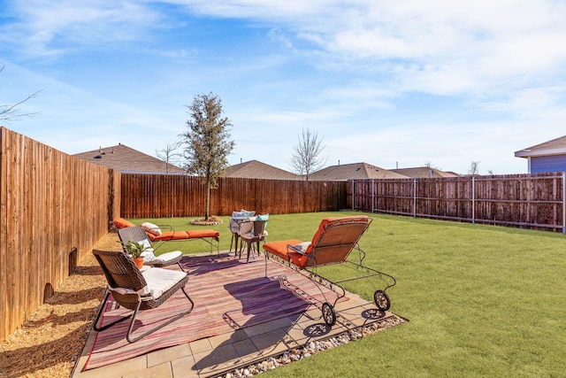 view of yard featuring a fenced backyard