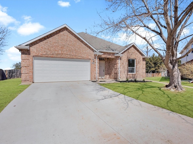 ranch-style home with brick siding, driveway, an attached garage, and a front yard