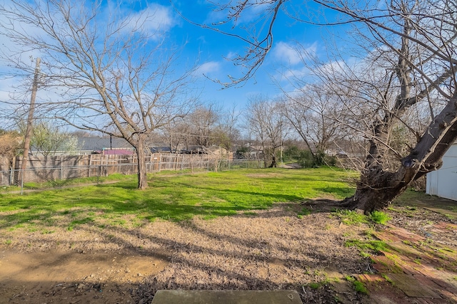 view of yard featuring fence