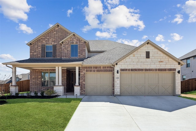 view of front of home featuring a front lawn, fence, concrete driveway, a shingled roof, and a garage