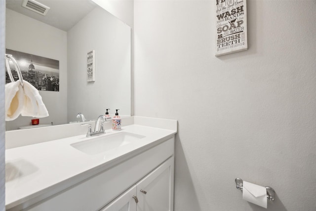 bathroom with visible vents and vanity