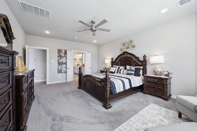 bedroom featuring recessed lighting, visible vents, and light carpet