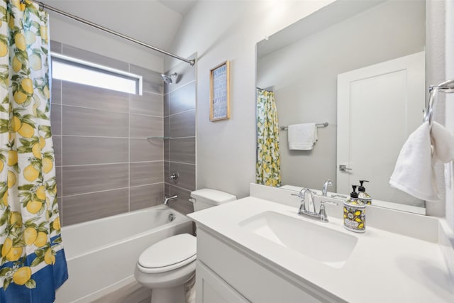 bathroom with vanity, toilet, and shower / tub combo