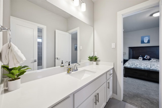 full bathroom featuring vanity and ensuite bathroom