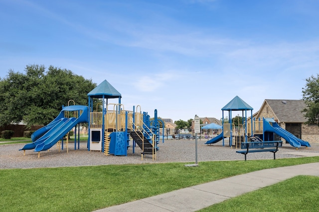 community playground featuring a yard