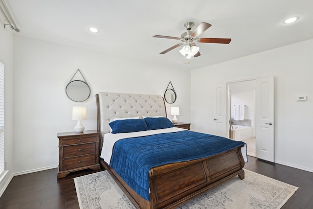 bedroom featuring ensuite bath, recessed lighting, baseboards, and dark wood-style flooring