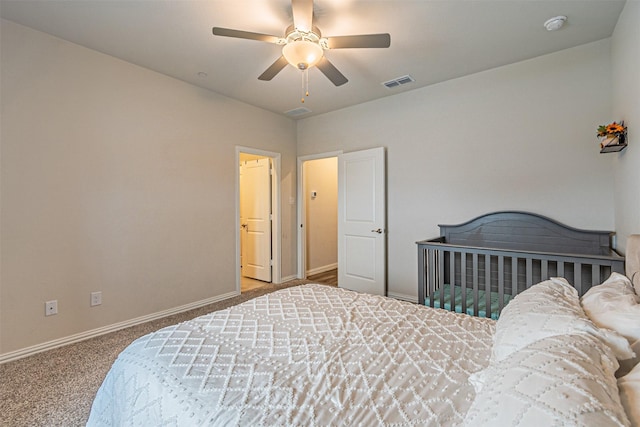 bedroom featuring visible vents, a ceiling fan, carpet, and baseboards