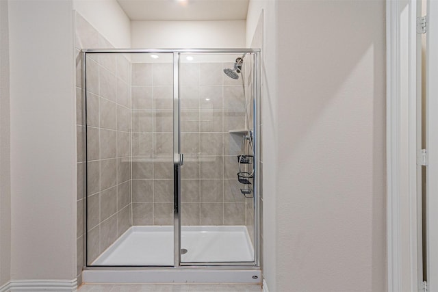 bathroom featuring a shower stall