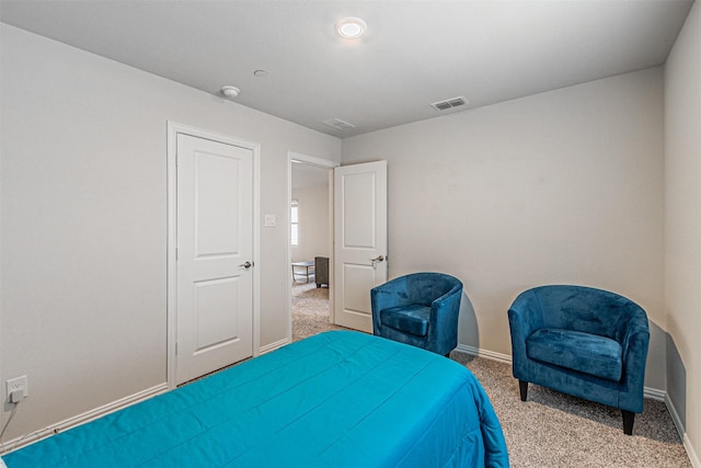 bedroom featuring carpet, visible vents, and baseboards