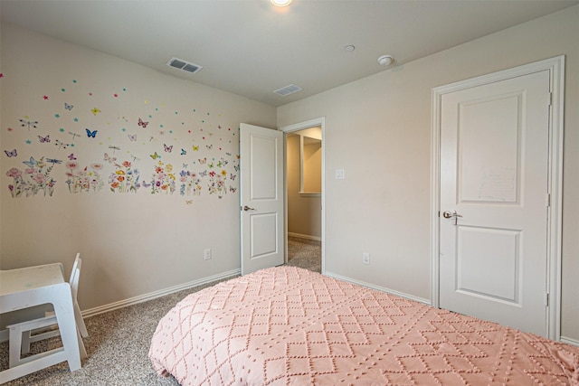 unfurnished bedroom with visible vents, baseboards, and carpet