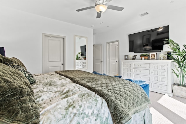 bedroom featuring a ceiling fan and visible vents