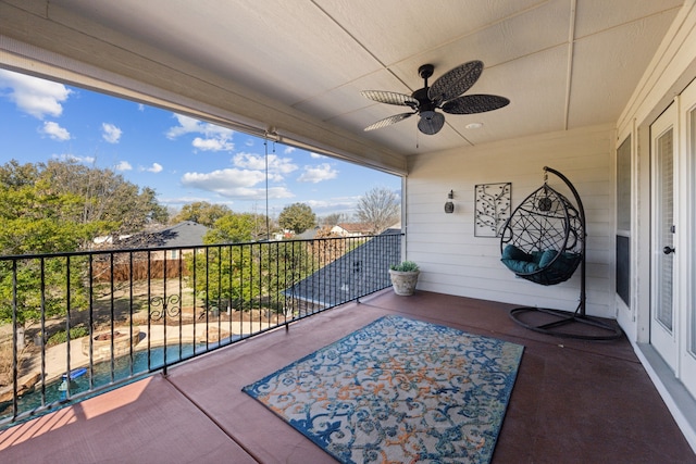 balcony featuring ceiling fan