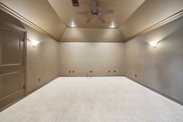 additional living space with visible vents, lofted ceiling, carpet floors, and ceiling fan