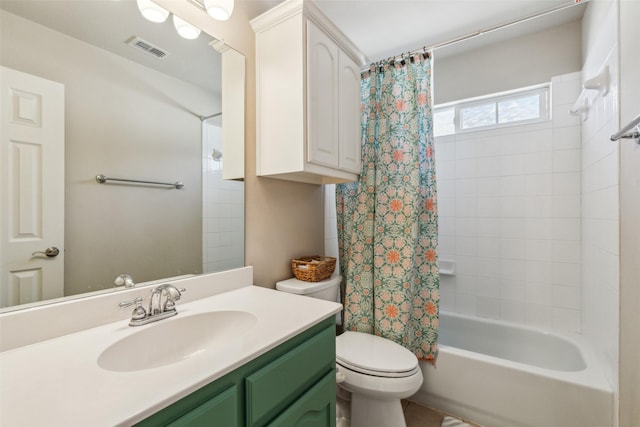 full bath featuring visible vents, vanity, toilet, and shower / bath combo with shower curtain