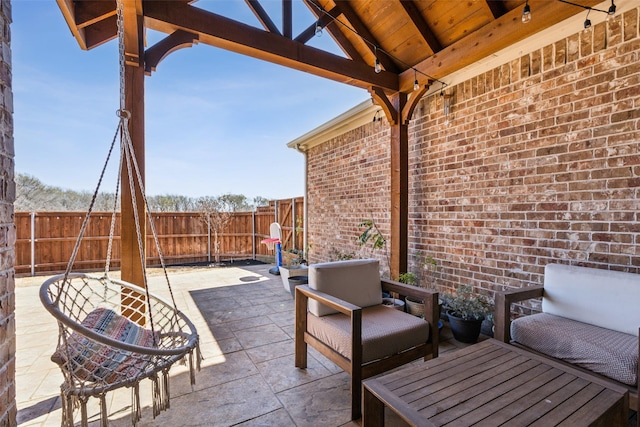 view of patio / terrace featuring outdoor dining space and a fenced backyard