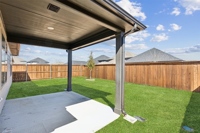 view of yard with visible vents, a patio, and a fenced backyard