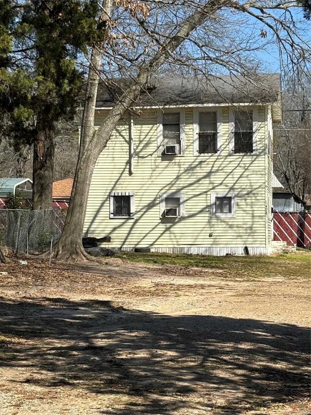 view of side of property with fence