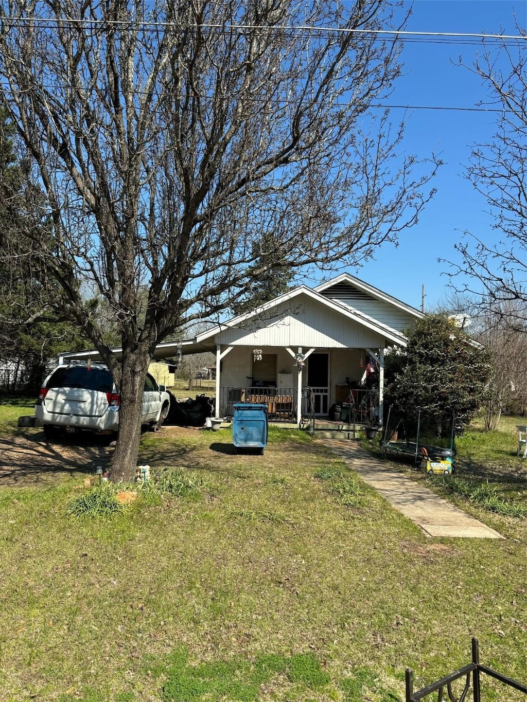 view of yard with covered porch