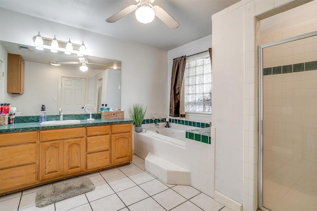 full bath with vanity, visible vents, a stall shower, tile patterned flooring, and a garden tub