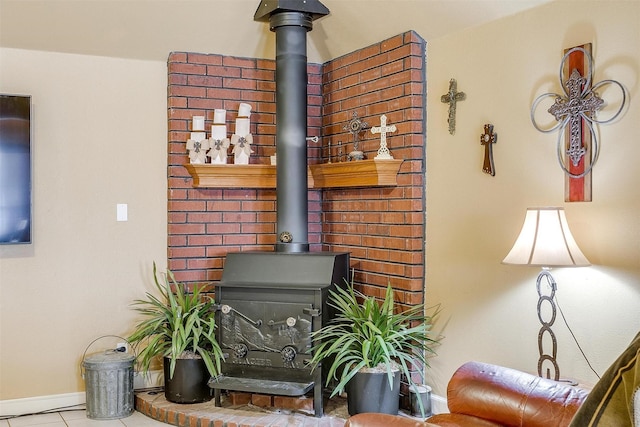 details featuring a wood stove and baseboards