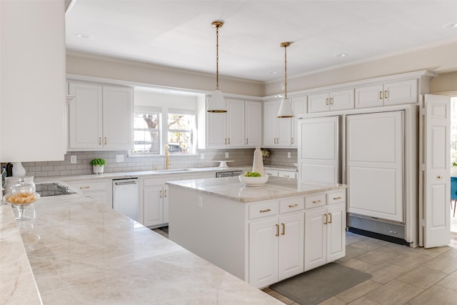 kitchen featuring white cabinetry, tasteful backsplash, and ornamental molding