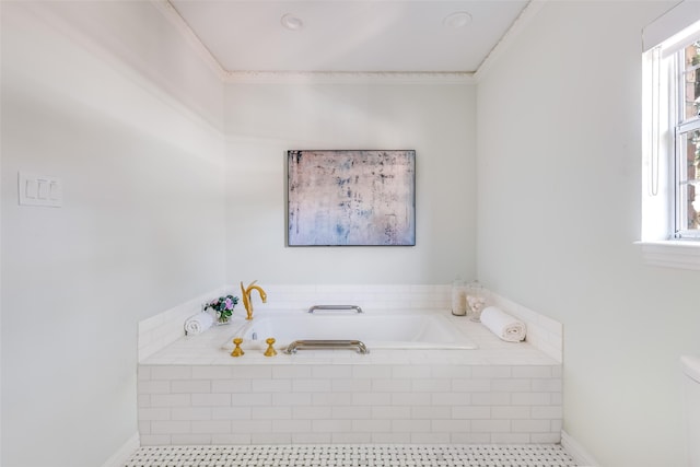 bathroom featuring a bath, tile patterned floors, crown molding, and baseboards