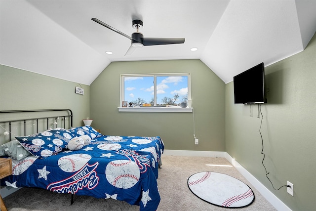 bedroom with lofted ceiling, carpet flooring, baseboards, and ceiling fan