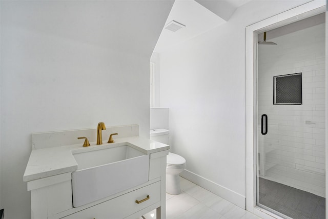 bathroom featuring visible vents, a shower stall, toilet, and vanity