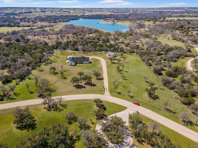 bird's eye view featuring a water view and a rural view