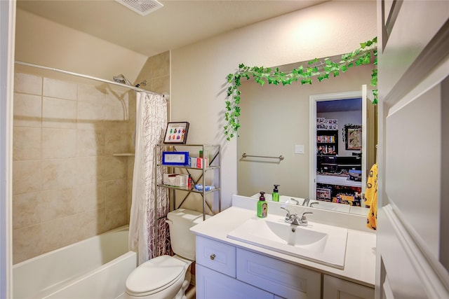 full bath with visible vents, shower / bathtub combination with curtain, toilet, and vanity