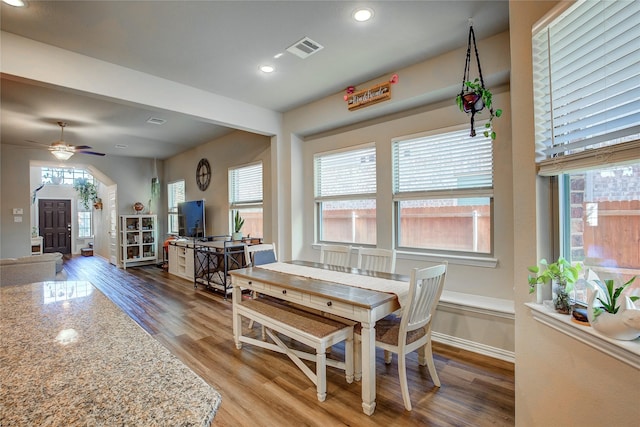 dining space with recessed lighting, visible vents, a healthy amount of sunlight, and wood finished floors