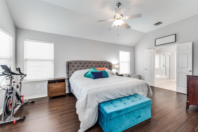 bedroom featuring visible vents, ceiling fan, baseboards, lofted ceiling, and wood finished floors