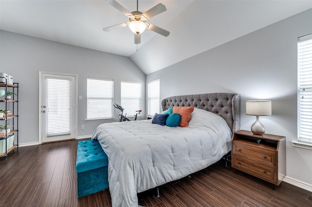 bedroom with dark wood finished floors, ceiling fan, baseboards, and lofted ceiling